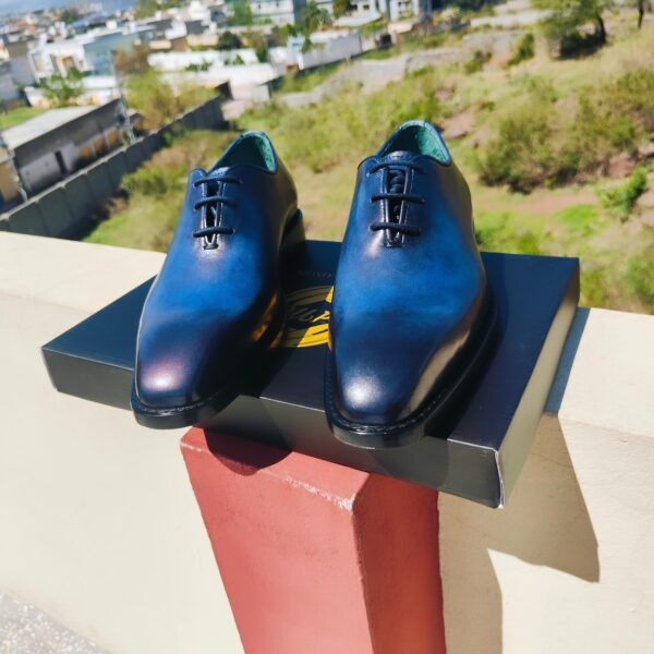 Blue Wholecut Oxford shoes handcrafted in premium leather with sleek seamless design