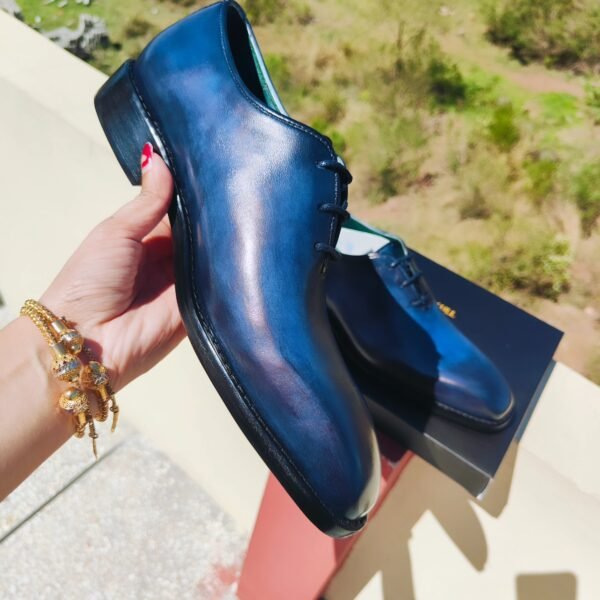 Blue Wholecut Oxford shoes handcrafted in premium leather with sleek seamless design