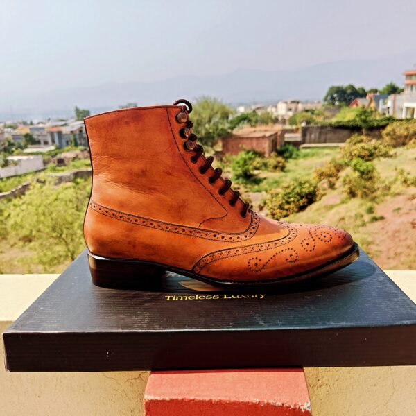 Wingtip Oxford Boots with round toe and Goodyear welt construction
