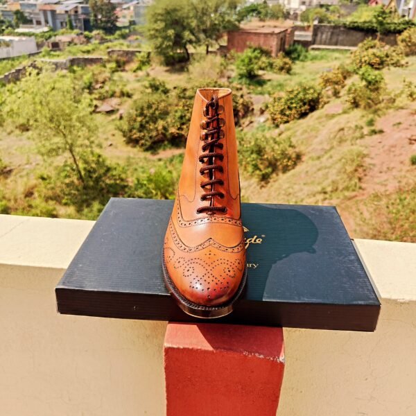 Wingtip Oxford Boots with round toe and Goodyear welt construction