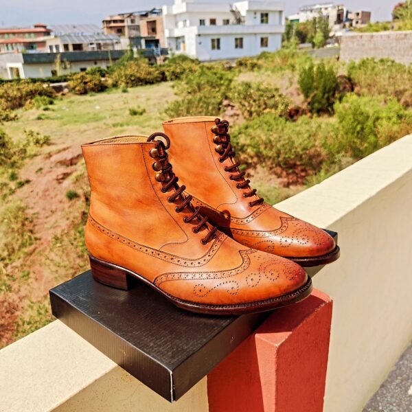 Wingtip Oxford Boots with round toe and Goodyear welt construction